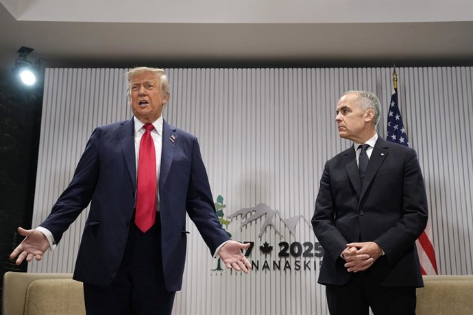 Archivo - Arquivo - 16 de junho de 2025, Canadá, Kananaskis: O primeiro-ministro canadense Mark Carney se reúne com o presidente dos EUA, Donald Trump, no Pomeroy Kananaskis Mountain Lodge, antes da cúpula dos líderes do G7 em Kananaskis. Foto: Adrian Wyl
