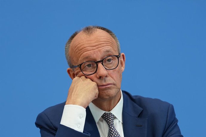 Archivo - 18 July 2025, Berlin: German Chancellor Friedrich Merz reacts during his summer press conference in Berlin. Merz is continuing the tradition of summer press conferences by German Chancellors. He will give a first interim assessment and answer qu