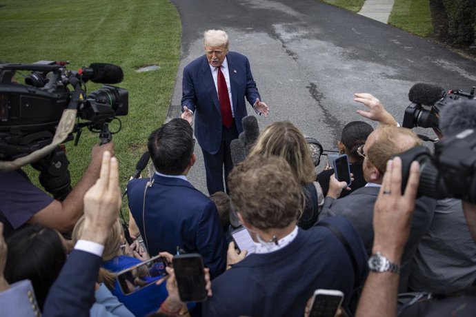 August 1, 2025, Washington, District Of Columbia, USA: U.S. President Donald Trump speaks to reporters on the South Lawn of the White House in Washington D.C., on August 01, 2025, before departing for Bedminster, New Jersey. Trump answered questions on tr