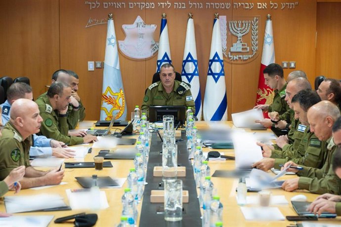 BEIJING, Aug. 14, 2025  -- This photo released by Israel Defense Forces (IDF) on Aug. 13, 2025 shows Israel's military chief Eyal Zamir (C) attending a meeting of security officials.   Eyal Zamir on Wednesday approved the main framework of a government pl