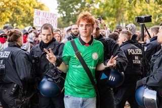August 18, 2025, Berlin, Berlin, Germany: Pro-Palestinian protesters gathered Monday, August 18, 2025, near Germany's Reichstag parliament building and the nearby chancellery, denouncing Israel's war against Hamas in Gaza. Demonstrators waved Palestinian 