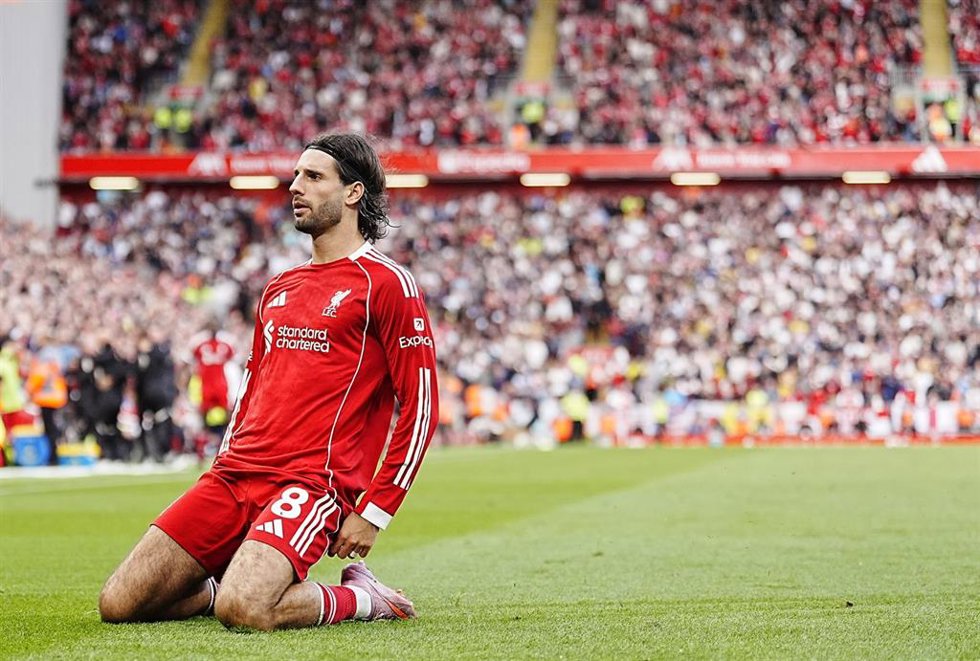 31 August 2025, United Kingdom, Liverpool: Liverpool's Dominik Szoboszlai celebrates scoring his side's first goal during the English Premier League soccer match between Liverpool and Arsenal at Anfield. Photo: Peter Byrne/PA Wire/dpa