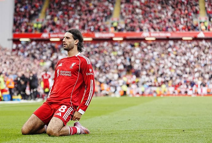 31 August 2025, United Kingdom, Liverpool: Liverpool's Dominik Szoboszlai celebrates scoring his side's first goal during the English Premier League soccer match between Liverpool and Arsenal at Anfield. Photo: Peter Byrne/PA Wire/dpa