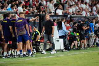 Hansi Flick, head coach of FC Barcelona, looks on during the Spanish League, LaLiga EA Sports, football match played between Rayo Vallecano and FC Barcelona at Estadio de Vallecas on August 31, 2025, in Madrid, Spain.