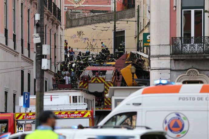 LISBON, Sept. 3, 2025  -- Firefighters and Public Security Police work on the site of the funicular accident in Lisbon, Portugal, on Sept. 3, 2025. The Gloria Funicular, one of Lisbon's best-known tourist attractions, derailed and overturned on Wednesday 