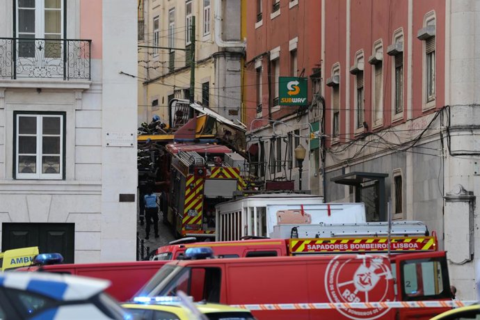 LISBON, Sept. 3, 2025  -- Firefighters and Public Security Police work on the site of the funicular accident in Lisbon, Portugal, on Sept. 3, 2025. The Gloria Funicular, one of Lisbon's best-known tourist attractions, derailed and overturned on Wednesday 