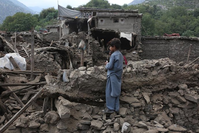KUNAR, Sept. 2, 2025  -- A boy stands on ruins at the earthquake-hit area in Nurgal district of Kunar province, Afghanistan, Sept. 1, 2025. The death toll from the powerful earthquake that struck eastern Afghanistan has climbed to 1,124, with 3,251 others