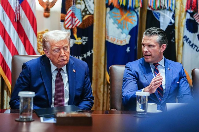 August 26, 2025, Washington, District Of Columbia, USA: United States Secretary of Defense Pete Hegseth speaks as US President Donald J Trump listens during a Cabinet meeting in the Cabinet Room of the White House in Washington, DC, USA, on Tuesday, Augus