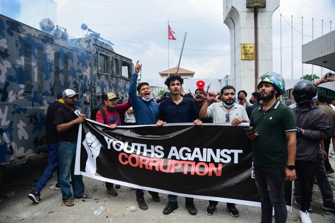 September 8, 2025, Kathmandu, Kathmandu, Nepal: Gen Z protesters clash with police after breaking barricades outside the parliament house at the Federal Parliament in Kathmandu, Nepal, on September 8, 2025. The demonstration, which started peacefully agai