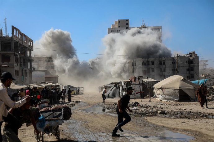GAZA, Sept. 8, 2025  -- Smoke raises from the "Vision" tower following an Israeli airstrike in Gaza City, on Sept. 8, 2025. Israeli forces intensified airstrikes on Gaza City on Monday, including the demolition of the "Vision" tower, a 14-story office bui