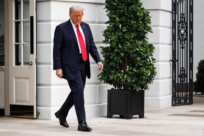 September 7, 2025, Washington, District Of Columbia, USA: United States President Donald J Trump walks out of the South Portico of the White House towards the gathered press before departing in Marine One from the South Lawn on September 7, 2025 in Washin