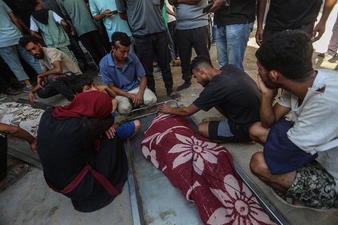 September 10, 2025, Gaza City, Gaza Strip, Palestinian Territory: Relatives of Palestinians, who lost their lives following the Israeli attacks on different part of the region, mourn as the bodies are brought to al-Shifa Hospital for funeral process in Ga