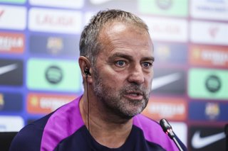 Hansi Flick, head coach of FC Barcelona attends his press conference during the training day of FC Barcelona ahead the Spanish League, La Liga EA Sports, football match against Rayo Vallecano at Ciudad Esportiva Joan Gamper on August 30, 2025 in Sant Joan