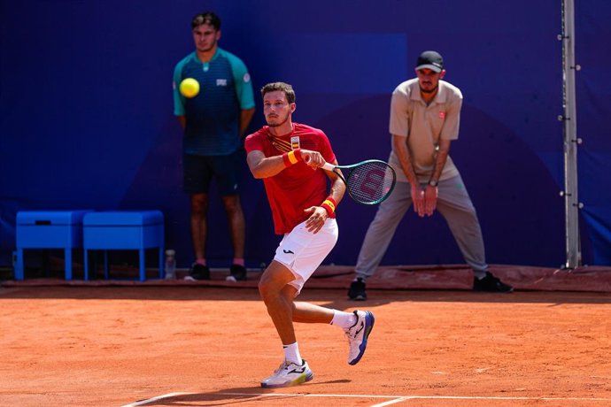 Archivo - Pablo Carreno Busta, da Espanha, em ação contra Matthew Ebden, da Austrália, e John Peers, da Austrália, durante a partida de tênis da segunda rodada de duplas masculinas em Roland-Garros - Quadra 13, durante os Jogos Olímpicos de Paris 2024, em