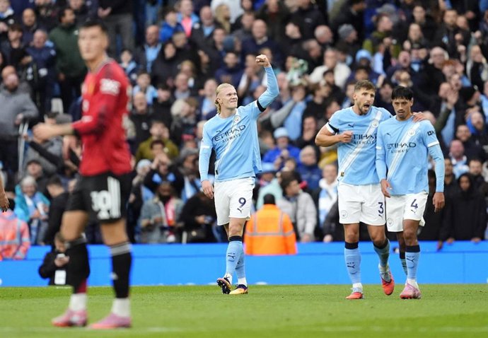 14 September 2025, United Kingdom, Manchester: Manchester City's Erling Haaland celebrates scoring their side's third goal of the game during the English Premier League soccer match between Manchester City and Manchester United at Etihad Stadium. Photo: N