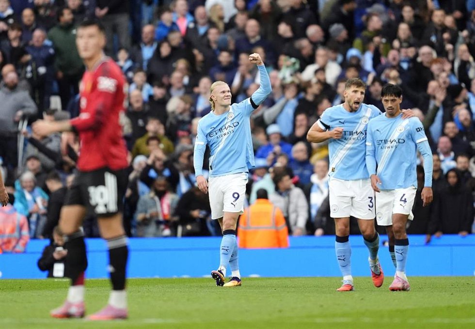 14 September 2025, United Kingdom, Manchester: Manchester City's Erling Haaland celebrates scoring their side's third goal of the game during the English Premier League soccer match between Manchester City and Manchester United at Etihad Stadium. Photo: