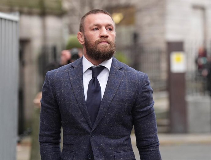Archivo - 19 November 2024, Ireland, Dublin: Mixed martial arts fighter Conor McGregor walks outside the High Court in Dublin, where he is appearing for a personal injury case against him. Nikita Hand, also known as Nikita Ni Laimhin, alleges she was rape