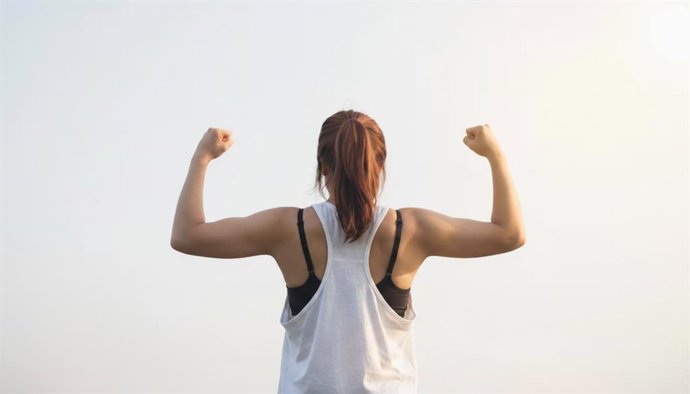 Alumna celebrando el éxito