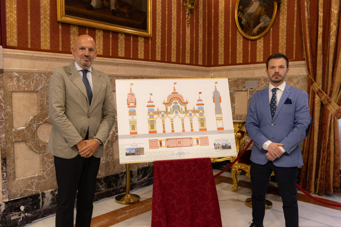 El delegado de Fiestas Mayores (i), junto al diseño de la portada de la Feria de Abril de 2026 y el autor del mismo, Davide Gambini.