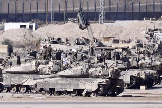 JERUSALEM, Sept. 16, 2025  -- Israeli military vehicles are seen near the southern Israeli border with Gaza, Sept. 16, 2025. Israel's military said on Tuesday it launched a "large-scale ground operation" in Gaza City overnight, as local officials reported