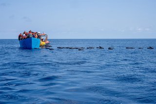 Archivo - March 16, 2024, Libyan Sar Zone, Libya: People on board of a wooden boat in the middle of the Mediterranean Sea. March 16, 2024, MSF vessel Geo Barents intercepted two small boats full of migrants navigating towards Europe in the Libyan SAR zone
