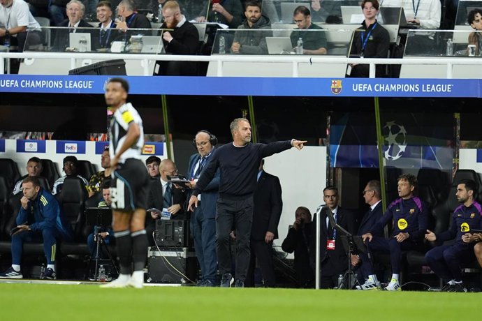 Hansi Flick, head coach of FC Barcelona, gestures during the UEFA Champions League 2025/26 League Phase MD1 match between Newcastle United FC and FC Barcelona at St James' Park on September 18, 2025 in Newcastle upon Tyne, England.