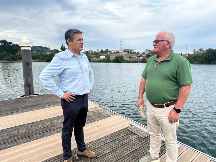 Pedro de Rueda, a la izquierda