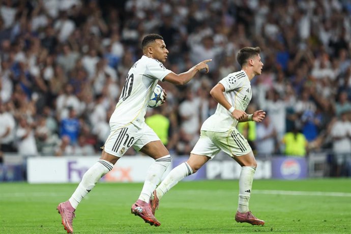 El delantero del Real Madrid Kylian Mbappé celebra un gol en la Champions.