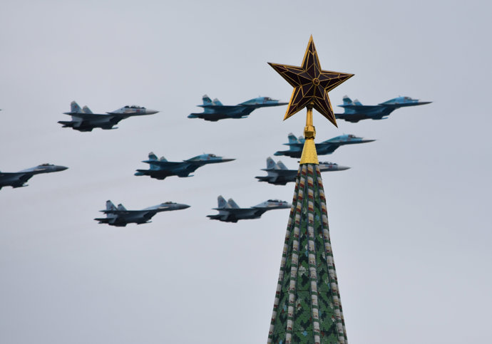 09 May 2020, Russia, Moscow: Russian Sukhoi Su-34, Sukhoi Su-35S and Sukhoi Su-30SM fighter jets fly in formation over Moscow's Red Square during a Victory Day air show marking the 75th anniversary of the victory over Nazi Germany in World War Two.