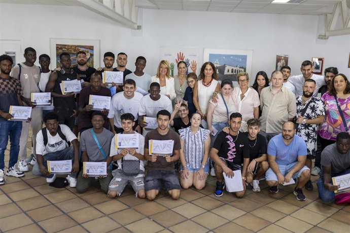 Foto de familia de un curso de Nuevos Horizontes.