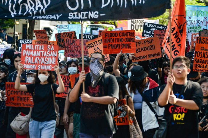 September 21, 2025, Manila, Ncr, Philippines: Progressive groups carry placards during the commeration of the 53rd Martial Law, in Manila on September 21, 2025..Filpinos take part in the rally and protests to combat massive corruption cases due to misalig