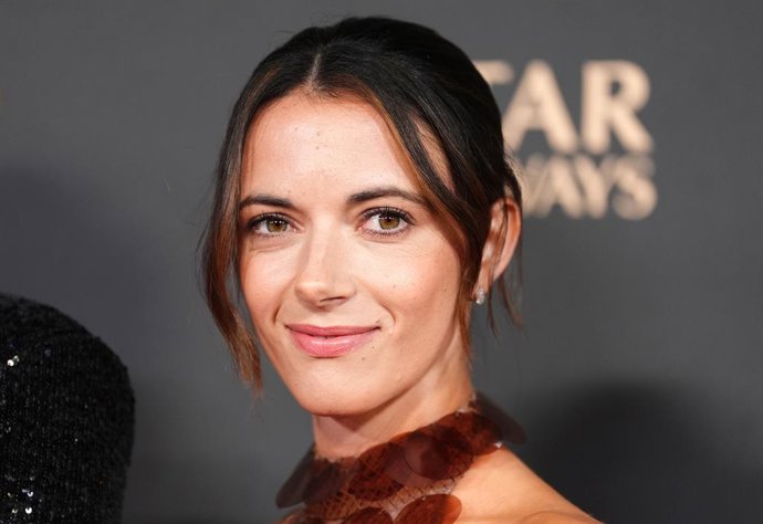 22 de setembro de 2025, França, Paris: A estrela do Barcelona, Aitana Bonmati, chega à cerimônia de premiação da Bola de Ouro 2025, no Theatre du Chatelet, em Paris. Foto: Adam Davy/PA Wire/dpa