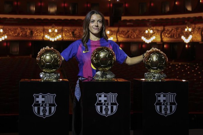 Aitana Bonmati of FC Barcelona poses with her three Ballon d'Or awards at the Gran Teatre del Liceu on September 25, 2025 in Barcelona, Spain.