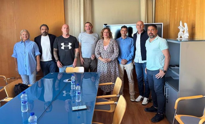 Representantes de CCOO y Aproser.