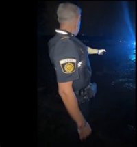 Una acequia de riego del barrio valenciano de La Torre se desborda por las lluvias