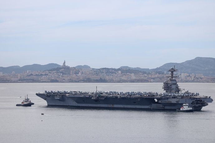 04 August 2025, France, Marseille: A View of the aircraft carrier USS Gerald R. Ford arriving at the Port of Marseille. The world's largest nuclear-powered aircraft carrier, the USS Gerald R.