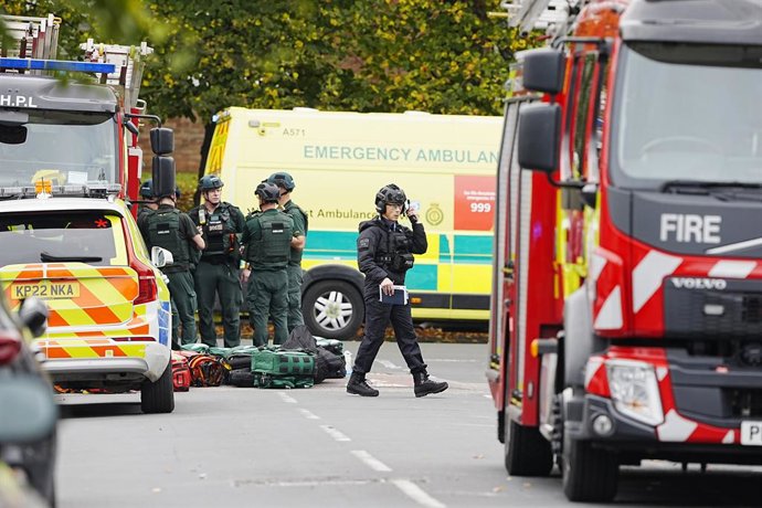 02 October 2025, United Kingdom, Manchester: Emergency services are at the scene of an incident at Heaton Park Hebrew Congregation synagogue in Crumpsall, where police shoot a suspect after several people are stabbed and a car is driven at members of the 