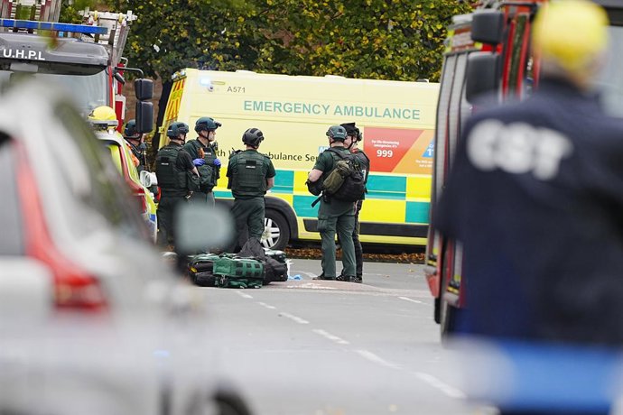 02 October 2025, United Kingdom, Manchester: Emergency services are at the scene of an incident at Heaton Park Hebrew Congregation synagogue in Crumpsall, where police shoot a suspect after several people are stabbed and a car is driven at members of the 