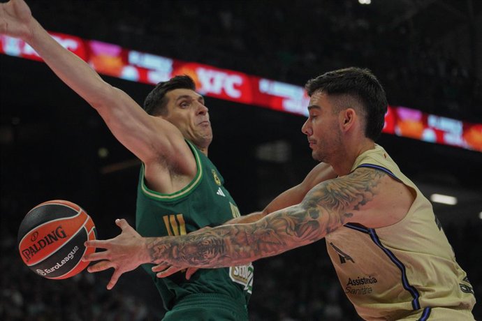 October 3, 2025, Athens, Athens, Greece: DINOS MITOGLOU and WILLY HERNANGOMEZ in action during the game Panathinaikos BC against Barcelona BC for the EuroLeague regular season at the Telekom Center Athens on October 3, 2025