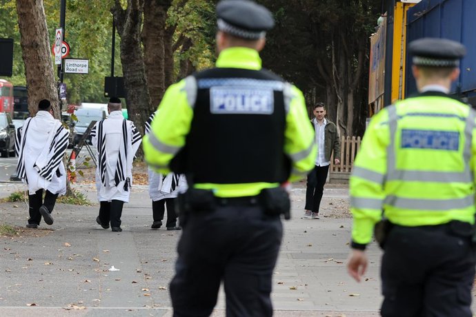 October 2, 2025, London, London, UK: London, UK. Police officers in Stamford Hill, North London, following a fatal attack in Crumpsall, Greater Manchester, where two people were died and three seriously injured. The incident involved a car being driven at