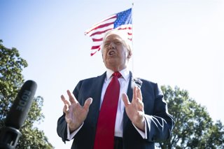 October 5, 2025, Washington, District Of Columbia, USA: United States President Donald J Trump speaks to members of the media on the South Lawn of the White House in Washington, DC, USA, before boarding Marine One to fly to Norfolk, Virginia on Sunday, Oc