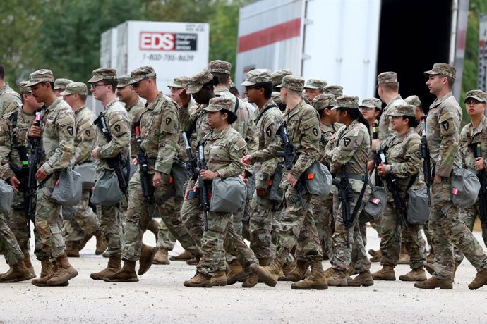 October 7, 2025, Elwood, Il, USA: Members of the Texas National Guard assemble in Elwood, Illinois, at the Army Reserve Training Center in the southwest suburb of Chicago, on Tuesday, Oct. 7. 2025.