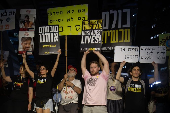 September 20, 2025, Tel Aviv, Israel: Protesters hold placards expressing their opinion during the demonstration. At the weekly demonstrations in Hostages Square calling for the release of all the hostages and an end to the war, tens of thousands of prote