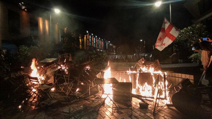 GEORGIA, TBILISI - OCTOBER 4, 2025: Opposition activists set fire near the residence of the President of Georgia calling for the peaceful overthrow of power on the day of municipal elections in Georgia,Image: 1043361211, License: Rights-managed, Restricti
