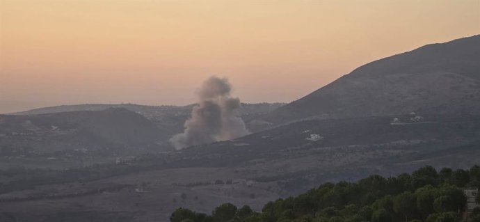 NABATIEH, Sept. 29, 2025  -- This photo taken with a mobile phone on Sept. 28, 2025 shows smoke caused by an Israeli airstrike targeting Hezbollah sites in the Jarmaq area of Nabatieh, southern Lebanon. Israeli warplanes struck Hezbollah targets in southe