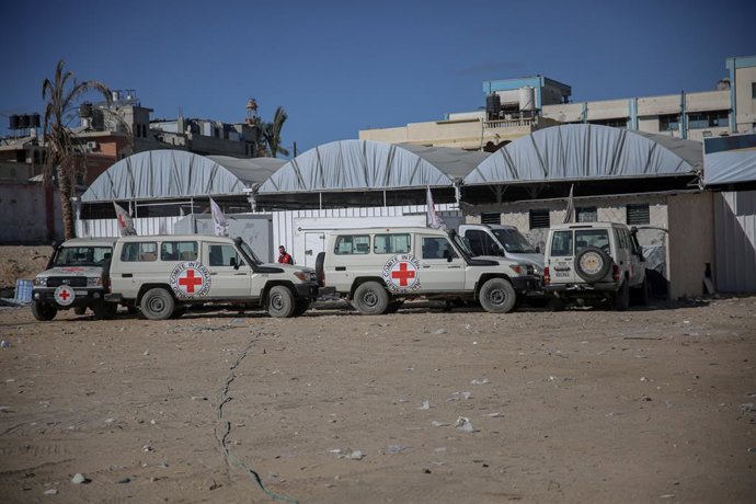 October 14, 2025, Khan Yunis, Gaza Strip, Palestinian Territory: Red Cross vehicles en route to retrieve bodies of Palestinians held by Israel to Gaza authorities for identification at Nasser Hospital following the ceasefire takes effect, in Khan Yunis, G
