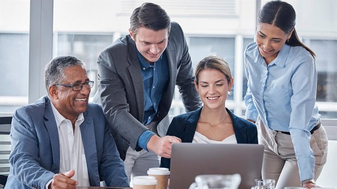 Teamland’s AI First corporate training in action, leaders practicing real-world AI workflows to drive measurable adoption.