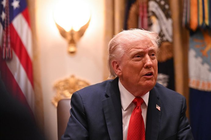 20 October 2025, US, Washington: US President Donald Trump speaks during a meeting with Australian Prime Minister Anthony Albanese in the Cabinet Room at the White House in Washington. Photo: Lukas Coch/AAP/dpa