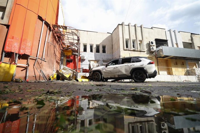 SCREENSHOT - 01 October 2025, Russia, ---: A view of a car outside a building of the Novaya Kakhovka Municipal Council damaged in a drone attack by the Armed Forces of Ukraine. Photo: Alexei Konovalov/TASS via ZUMA Press/dpa