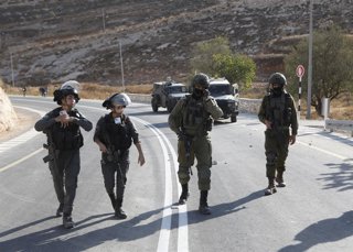 October 23, 2025, Hebron, West Bank, Palestinian Territory: Palestinian farmers are blocked from their olive groves by Israeli forces in the village of Saâ€ir, east of Hebron, after settlers and troops declared the area a closed military zone, Hebron, Wes